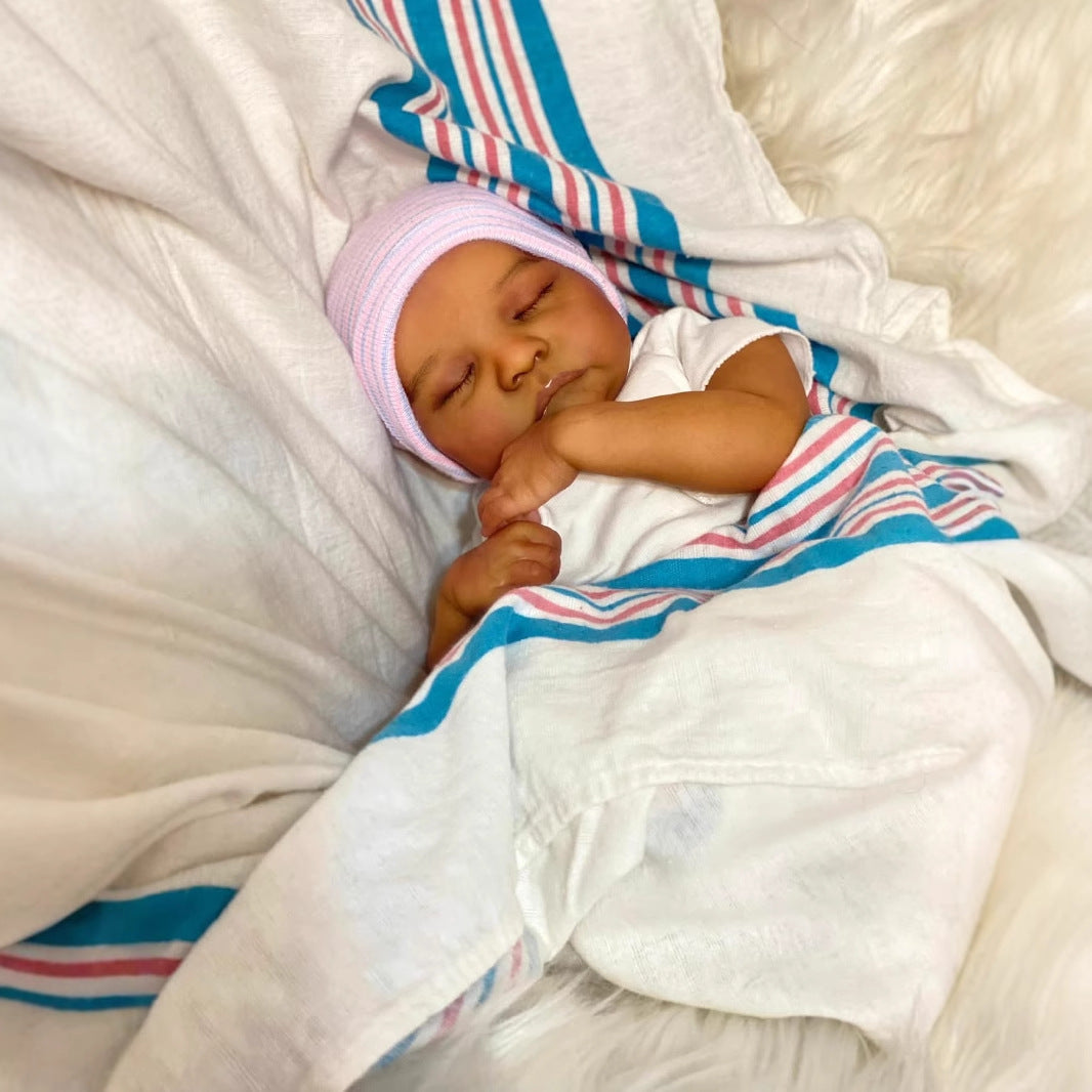 Poupée Reborn Miles de 45 cm yeux fermés peau foncée - Levi