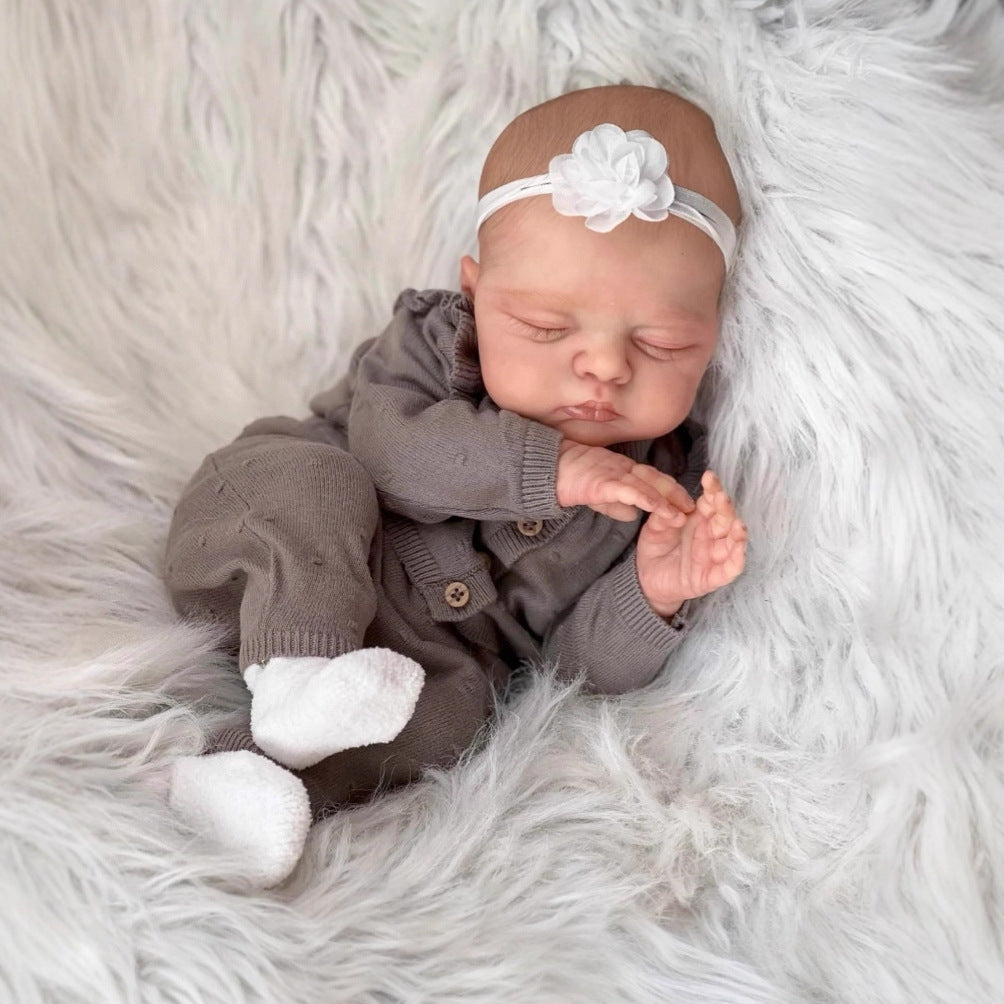 Poupée Reborn Irys corps souple et endormi 50cm