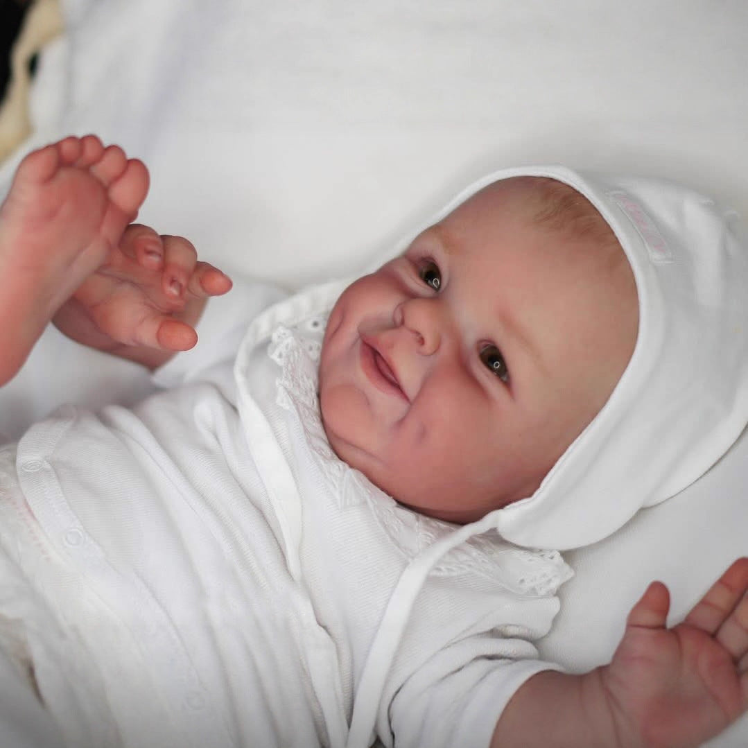 Bébé Reborn de 55cm yeux ouverts corps souple et souriant - Shaya