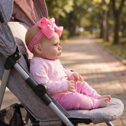 Poupée reborn héron de 48 cm aux yeux ouverts vêtue d'une tenue à rayures roses