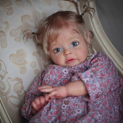 Poupée Reborn Suesue de 60 cm cheveux blonds yeux ouverts vêtements à fleurs violettes