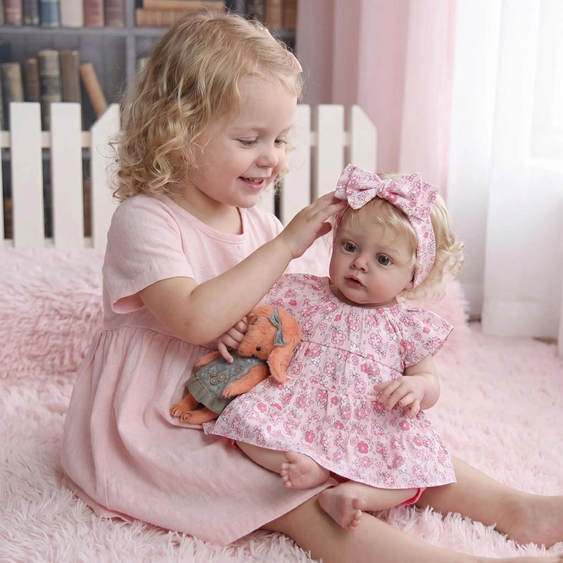 Poupée reborn Chloé blonde de 48 cm (19 pouces) en robe à fleurs