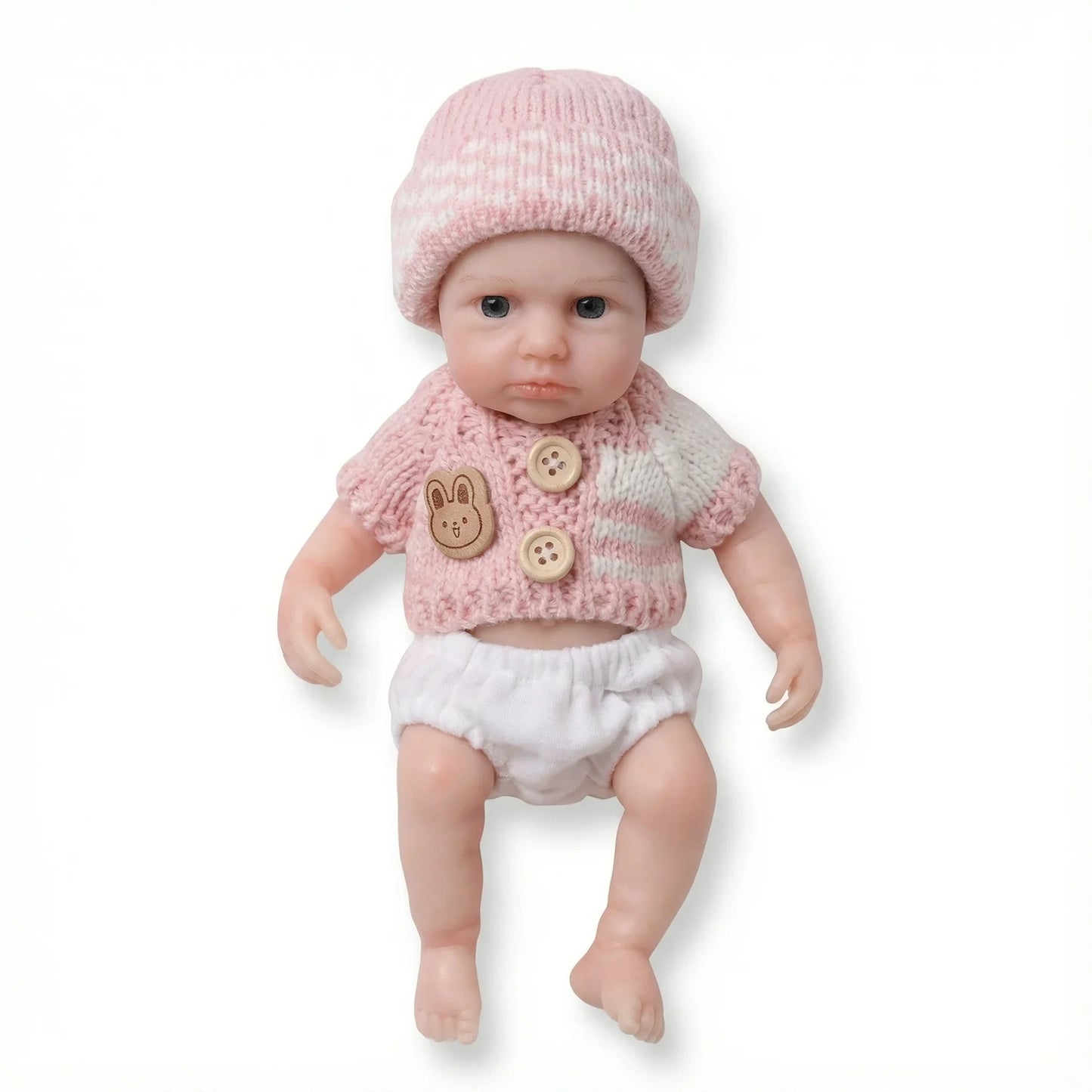 Bébé reborn Loulou fille de 20 cm yeux ouverts entièrement en silicone vêtue d'un pull rose