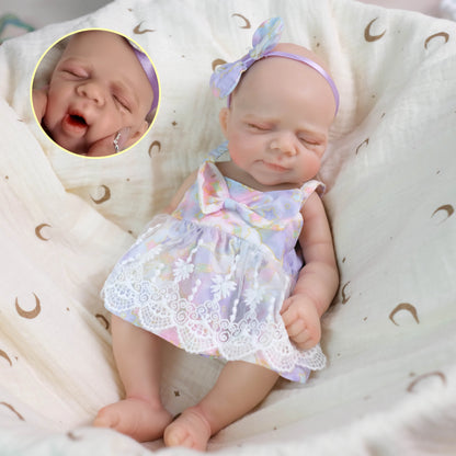 Poupée reborn Pascale de 30 cm en silicone souple bouche ouvrante vêtue d'une robe à fleurs