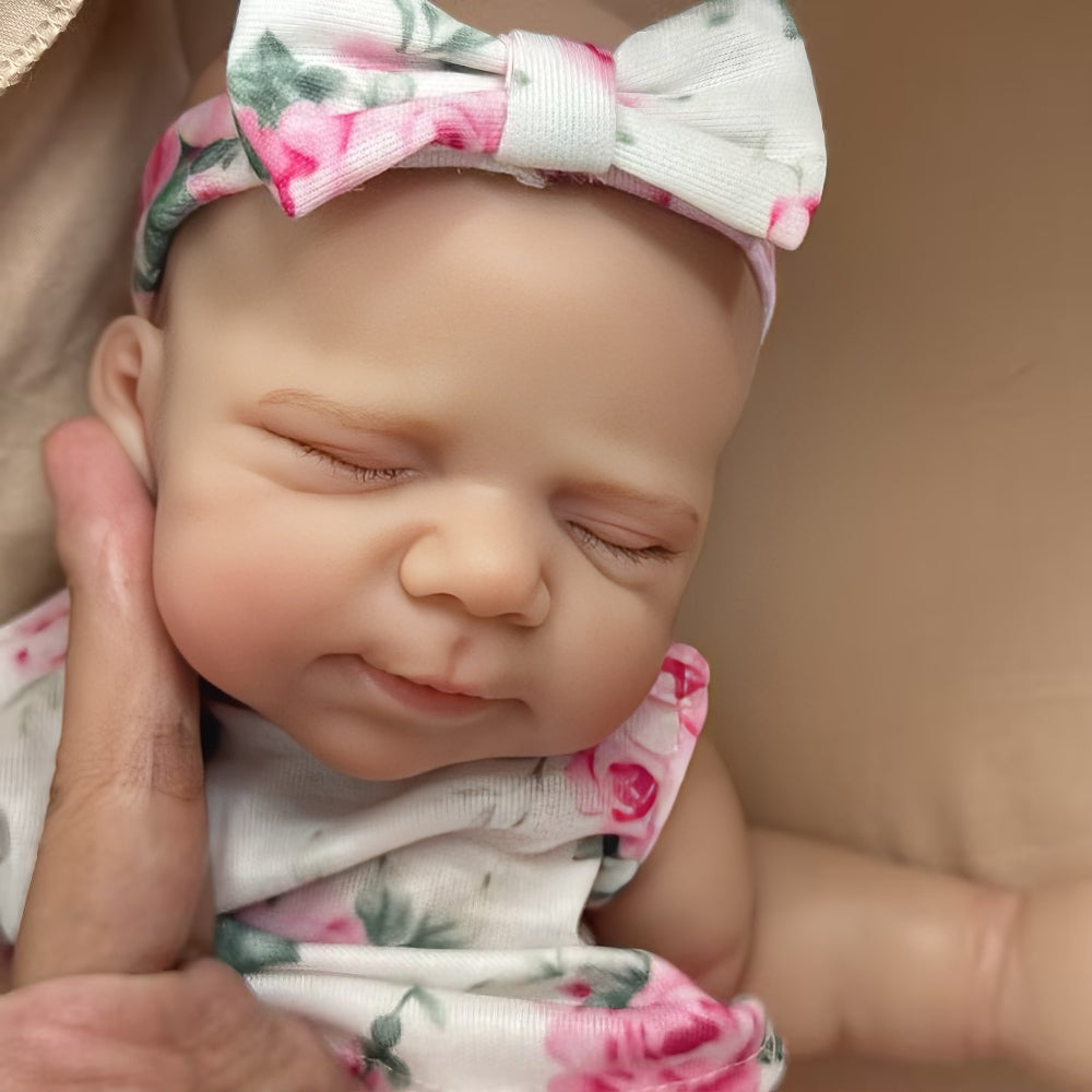Poupée reborn Pascale de 30 cm adorable entièrement en silicone vêtue d'une tenue florale rose