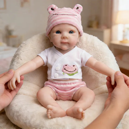 Bébé reborn Bettie en silicone de 30 cm fille vêtue de vêtements roses