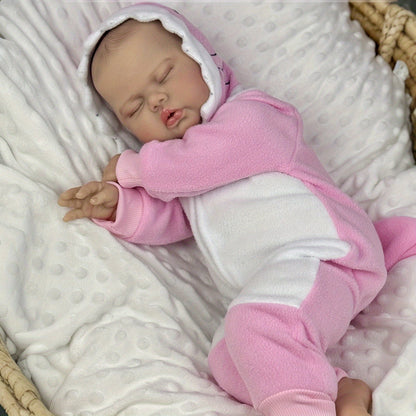 Poupée reborn de 50 cm corps en tissu doux en forme de cornichon endormi vêtue d'une tenue rose