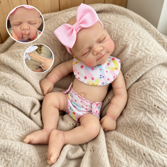 Poupée reborn Pascale de 30 cm entièrement en silicone endormie vêtue de tenues à fleurs roses