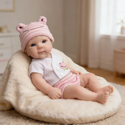Bébé reborn Bettie en silicone de 30 cm fille vêtue de vêtements roses