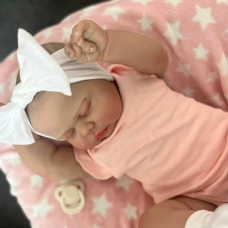 Poupée Reborn Pickle de 60 cm yeux fermés vêtements roses