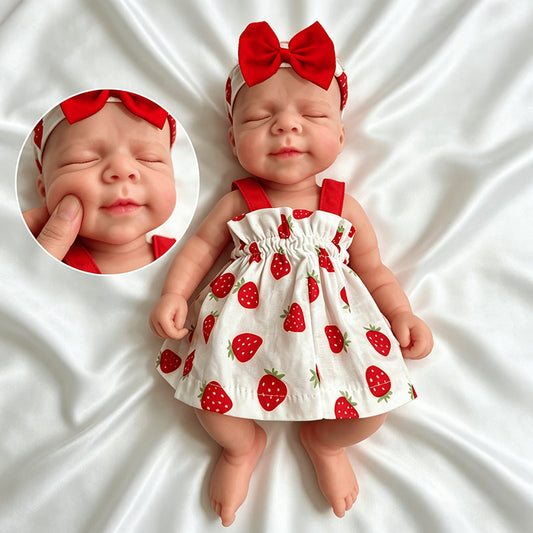 Pascale Reborn bébé fille en silicone souple 30cm avec robe fraise