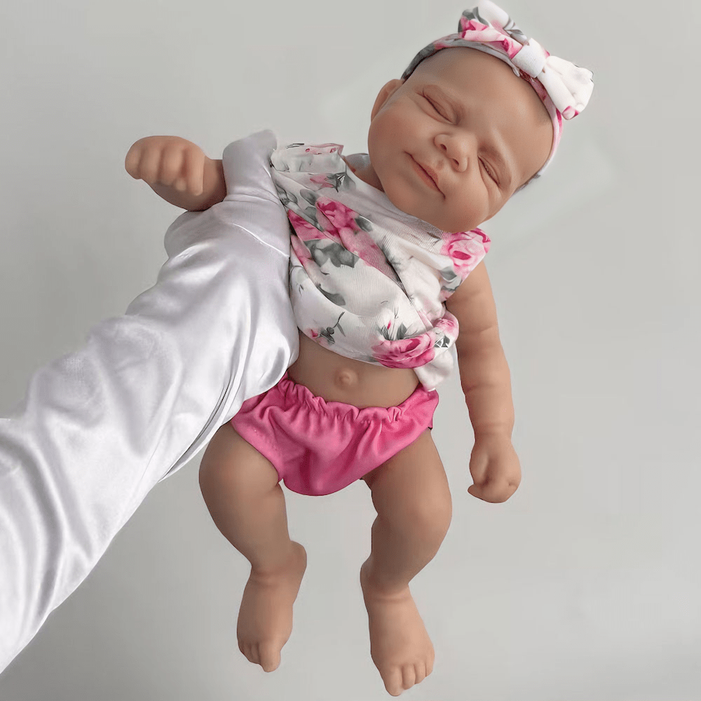 Poupée reborn Pascale de 30 cm adorable entièrement en silicone vêtue d'une tenue florale rose