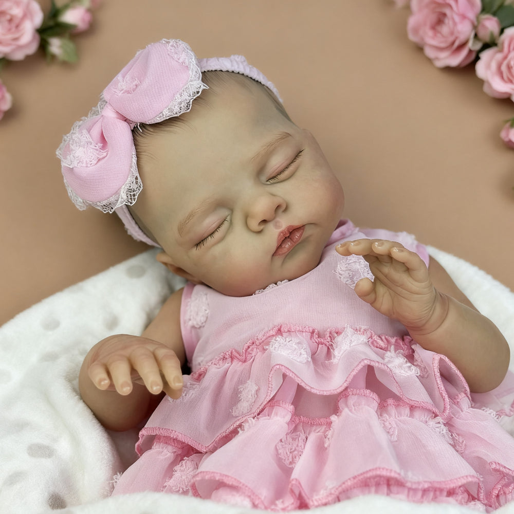 Poupée reborn Irys de 48 cm corps souple endormie en robe rose