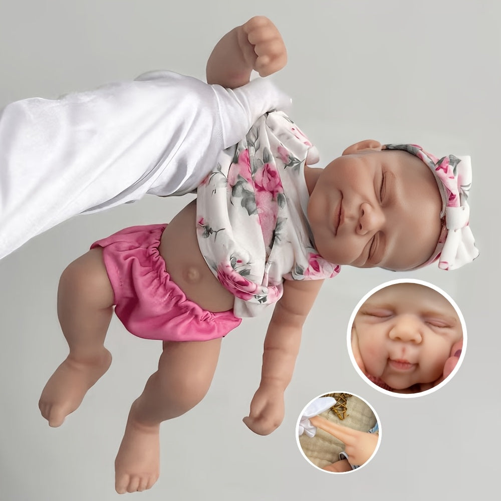Poupée reborn Pascale de 30 cm adorable entièrement en silicone vêtue d'une tenue florale rose
