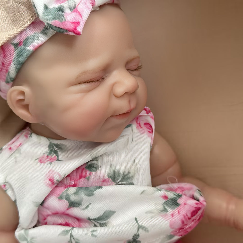Poupée reborn Pascale de 30 cm adorable entièrement en silicone vêtue d'une tenue florale rose