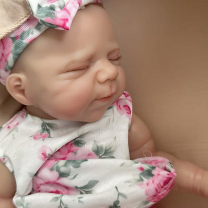 Poupée reborn Pascale de 30 cm adorable entièrement en silicone vêtue d'une tenue florale rose