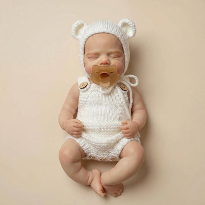 Poupée reborn Pascale de 30cm en silicone intégral vêtue de tenues blanches