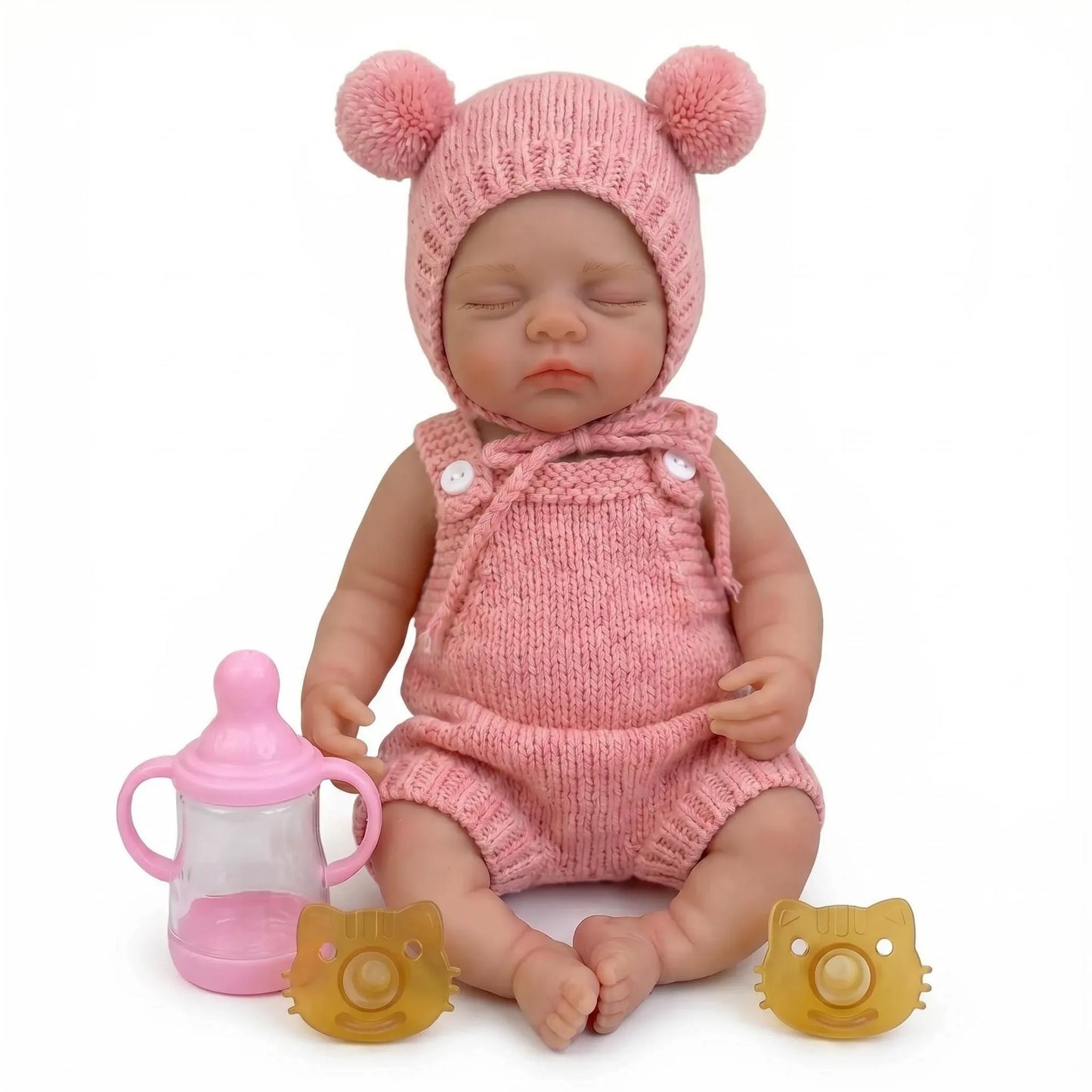 Poupée reborn Irys de 30cm en silicone intégral fille vêtue de tenues roses