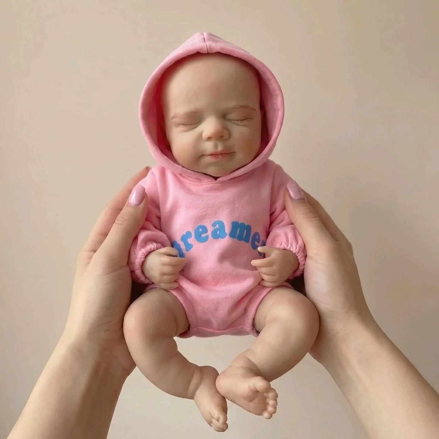Poupée reborn Pascale de 30cm en silicone intégral vêtue de tenues roses