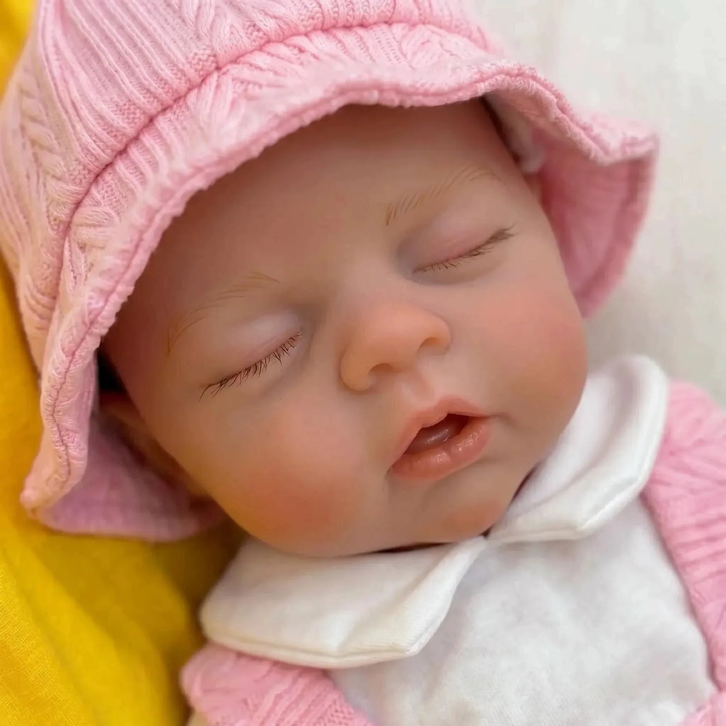 Poupée reborn Irys de 30cm en silicone fille en robe rose