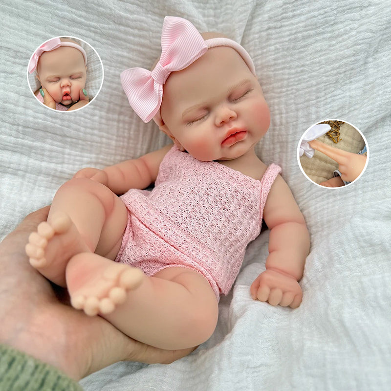 Poupée reborn Pickle de 30 cm entièrement en silicone yeux fermés en tenue rose