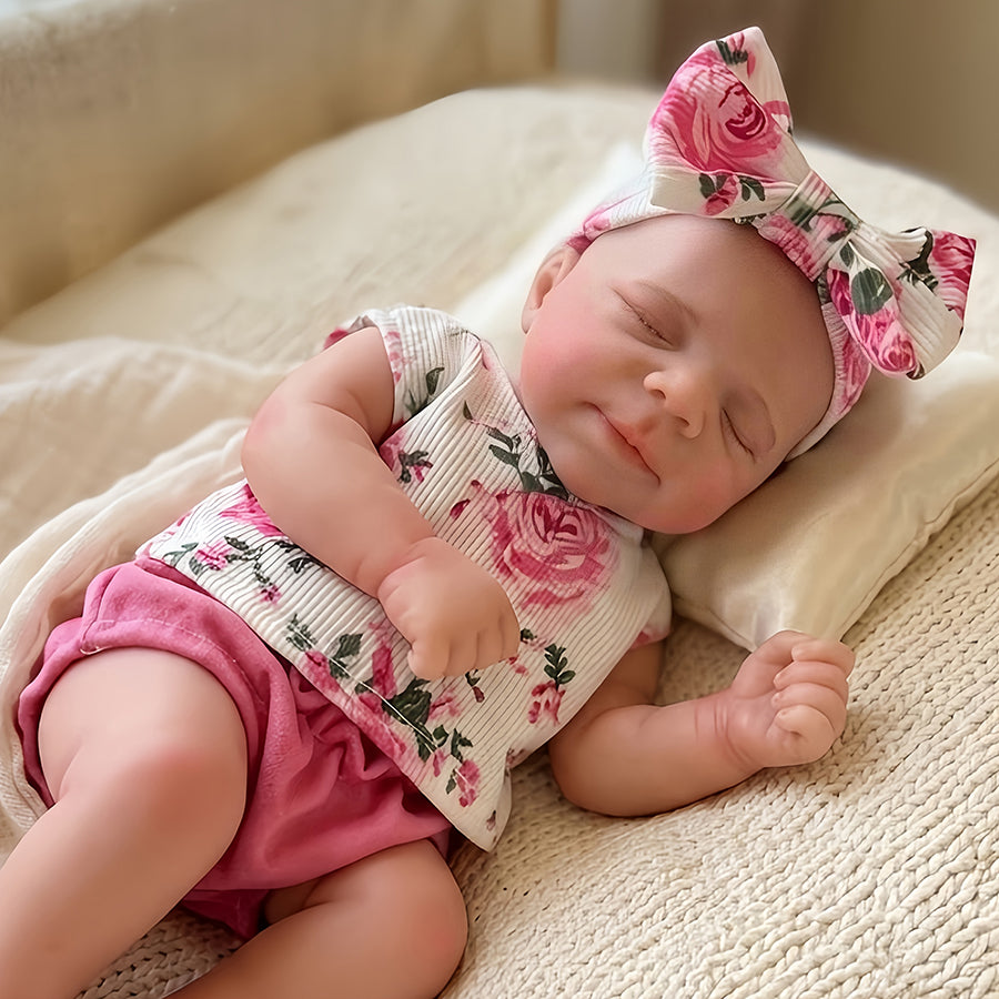 Poupée reborn Pascale de 30 cm adorable entièrement en silicone vêtue d'une tenue florale rose