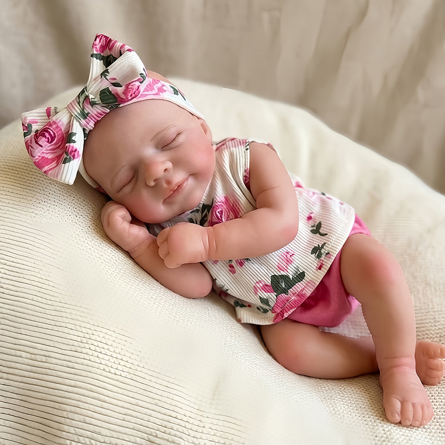 Poupée reborn Pascale de 30 cm adorable entièrement en silicone vêtue d'une tenue florale rose